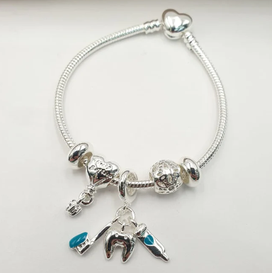 PULSERA MULTICHARMS PLATEADA