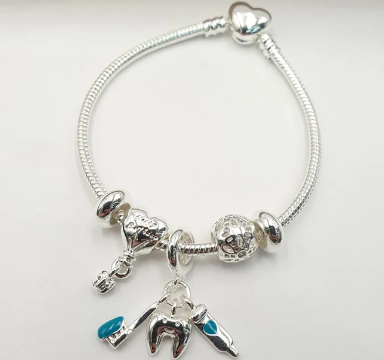 PULSERA MULTICHARMS PLATEADA