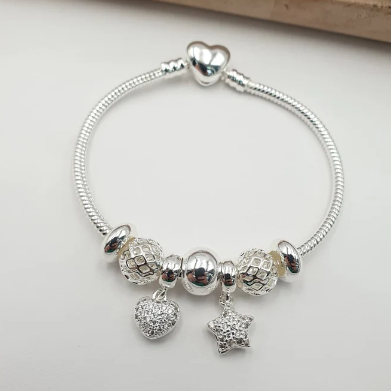 PULSERA MULTICHARMS PLATEADA