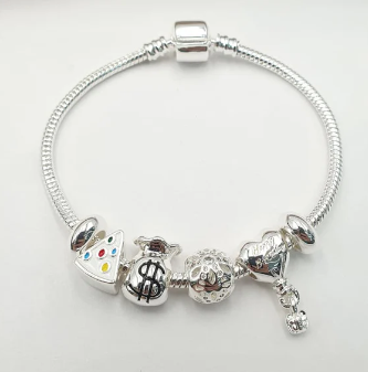 PULSERA MULTICHARM PLATEADA