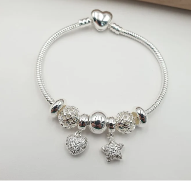PULSERA MULTICHARMS PLATEADA