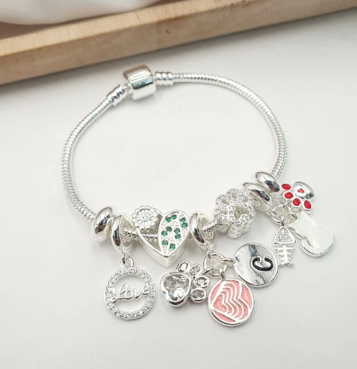 PULSERA MULTICHARMS PLATEADA