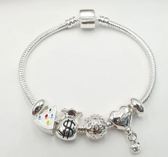 PULSERA MULTICHARM PLATEADA