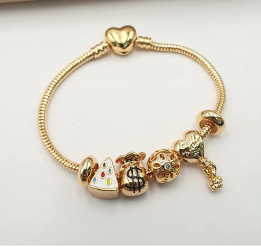 PULSERA MULTICHARMS DORADO