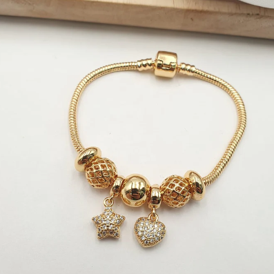 PULSERA MULTICHARMS DORADO